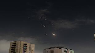 JERUSALEM, April 14, 2024 -- Israeli air defense system launches to intercept missiles in Tel Aviv, Israel,